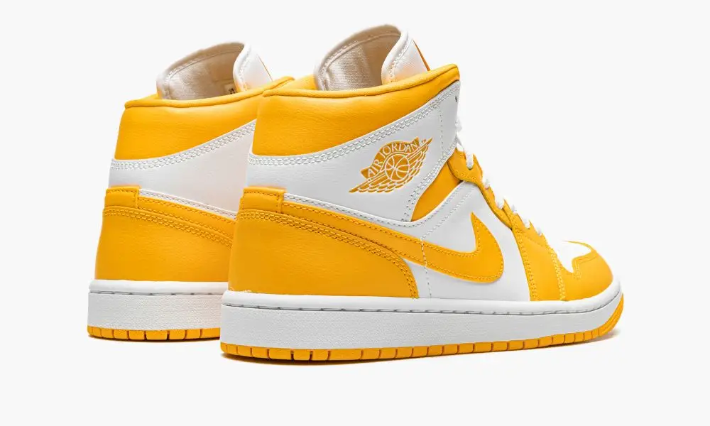 Wmns Jordan 1 Mid "White University Gold"